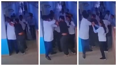 father beating teacher in Maharashtra