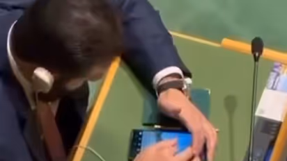 Syrian President Ahmed al-Sharaa Scrolling Through Mobile at UNGA