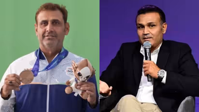 Mairaj Ahmad Khan and Virender Sehwag