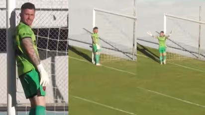 Argentine Goalkeeper Gustavo Tesonotte Turns His Back During the Penalty