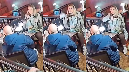 Woman Caught on CCTV Allegedly Stealing Table Lamp From Derbyshire Bar