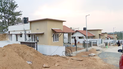 chooralmala disaster victim sad over delayed township construction