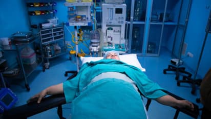 woman lying unconscious