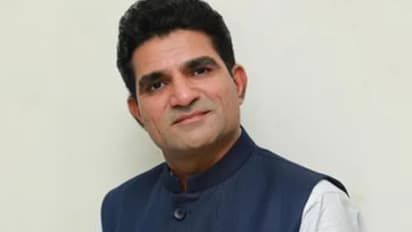 Gujarat AAP president Isudan Gadhvi 