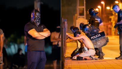 Masked protesters during fourth night of riots on July 14 in Spain's Torre Pacheco