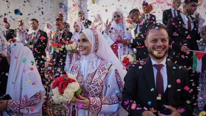 gaza 54 couples mass wedding amid war debris story