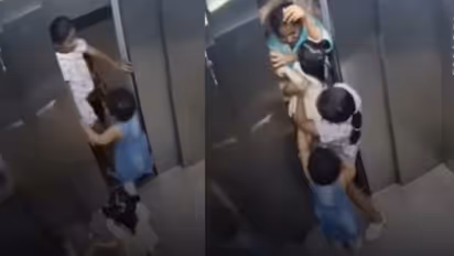 cctv elevator door malfunction girl saves children lift safety sensor failure viral video debate