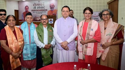 pushkar singh dhami meets writers