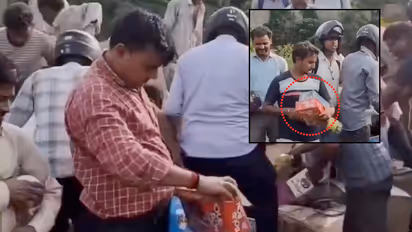 Kanpur Viral Video Crowd Rushes to Collect Discarded Chocolates Police Order Probe