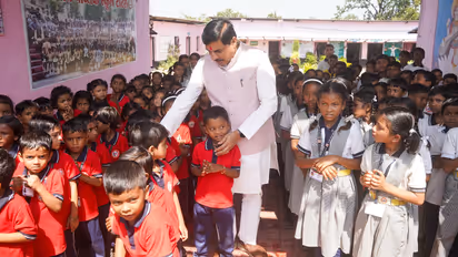 Mohan Yadav in Mandla meet school children