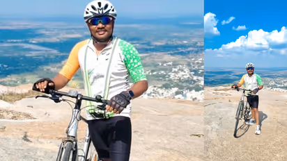 AP Engineer Carries Cycle Up Madhugiri Fort on World Tourism Day