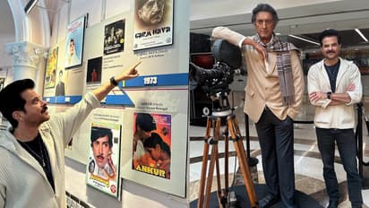 Anil Kapoor photographed standing next to Satyajit Rays statue at the Film Museum bsm