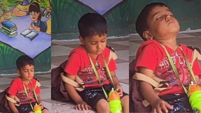 Toddler dozing off outside school