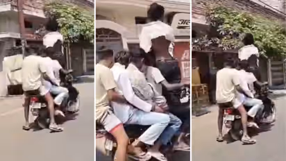 UP bike stunt viral video shows Boy Standing on Moving Bike as 5 Youths Break Traffic Rules in Mau