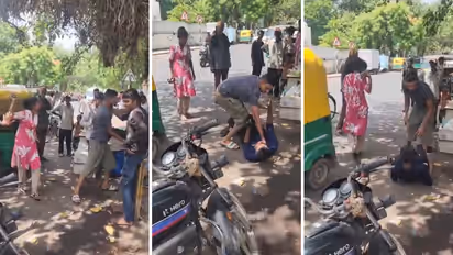 Gujarat Viral Video Two Youths and Woman Chase and Beat Man Outside Rajkot Civil Hospital