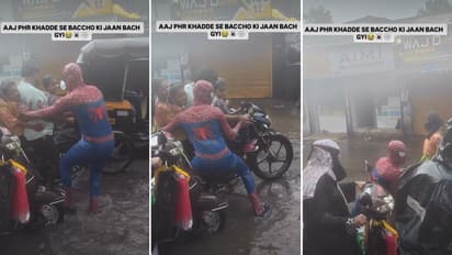 Maharashtra Rain Bhiwandi Spider Man Helps Biker with Children Cross Flooded Pothole Wins Hearts Online