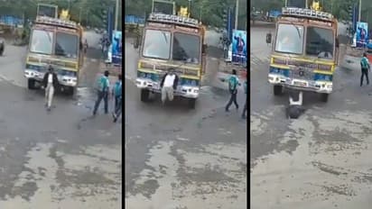 Karnataka road accident caught on camera pedestrian survives after truck hits from behind in Tumkur