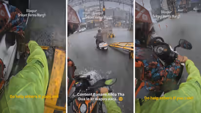 Bright Side Stories Chhattisgarh Bilaspur biker rescues elderly woman trapped on flooded road viral video wins hearts