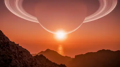 Saturn from the moon Titan, alien landscape with methane ocean 