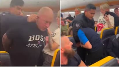 Drunk passenger tries to open plane's emergency exit, dragged off by ear