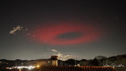 Red halo over Possagno captured by Valter Binotto