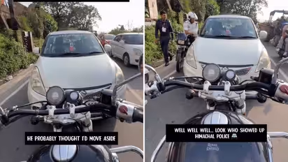 Biker Refuses To Give Way To Wrong-Side Car, Traffic Cop Arrives Just in Time And Makes Driver Pay Fine