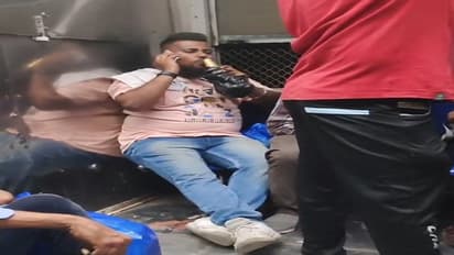 mumbai news, appeal to action on passenger drinking alcohol inside local train, video goes viral