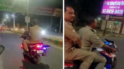 women chasing policeman