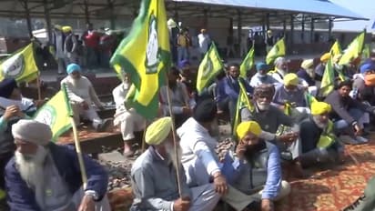 Protesters sitting on rail tracks