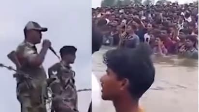 BSF officer tries to pacify desperate Bangladeshis