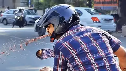spitting on the road