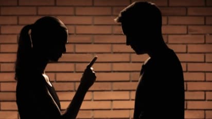 man fraustated with wife