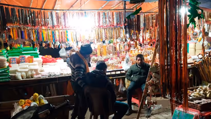 Prayagraj-Mahakumbh-2025-updates-shops-selling-worship-materials-set-up-in-Sangam-area