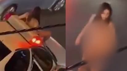 Iranian woman protests hijab laws 