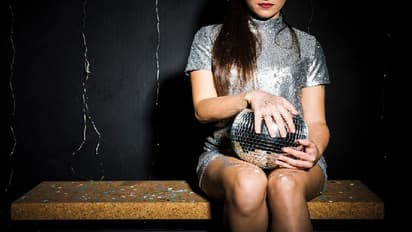 woman with disco ball