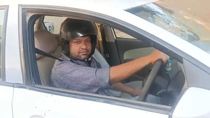 UP Man Drives Car Wearing Helmet