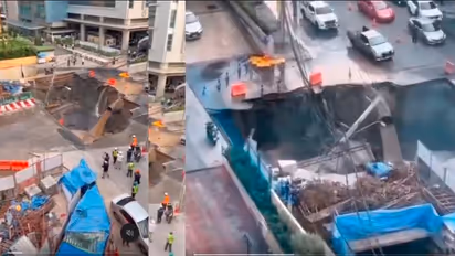 Deep Sinkhole Swallows Cars Power Poles