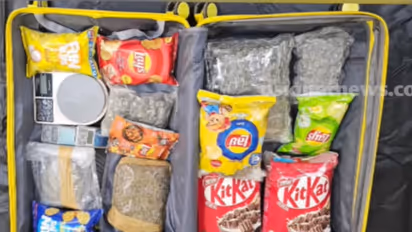 Bengaluru Police displaying seized Hydro Ganja, MDMA, and LSD stamps from the arrested drug trafficking gang