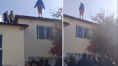 Woman Jumps Off Rooftop After Breakup, Police Catch Her Mid-Fall in Dramatic Rescue