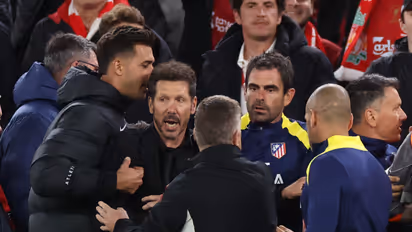Atletico Madrid's Simeone confronts Liverpool fans
