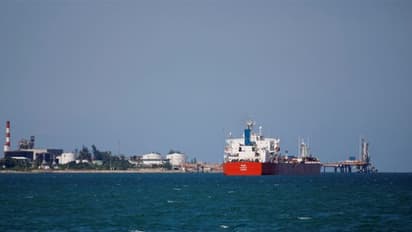 US Navy ship in action targeting a vessel off the coast of Venezuela suspected of carrying illegal drugs