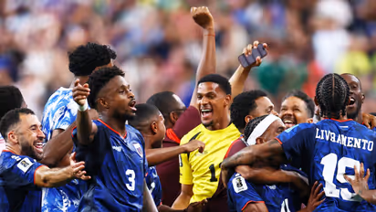 Cabo Verde's Diney Borges and teammates celebrate after the match as they qualify for the knockout stages of the FIFA World Cup (Photo: Reuters)