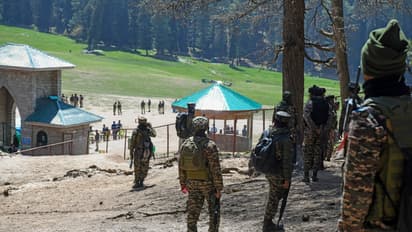 Security personnel carry out a search operation at Baisaran following the Pahalgam terrorist attack
