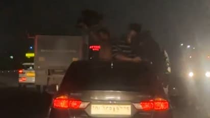 Viral video youths travel by car with their lives in their hands Bengaluru police are taking strict action bsm
