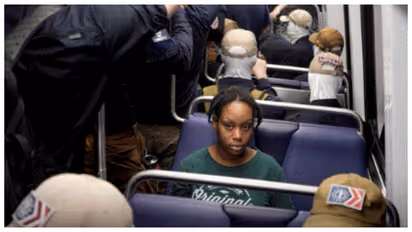 woman among Patriot Front members