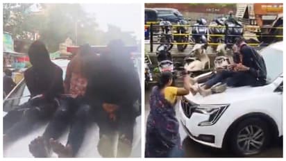 minor murder suspects tied to bonnet of police car