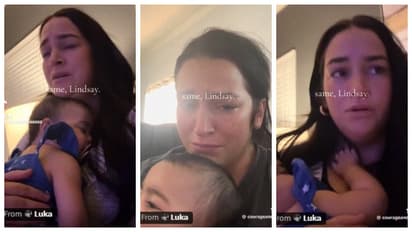 mothers holding babies and crying