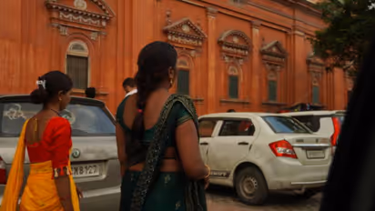 back side photo of married woman in saree