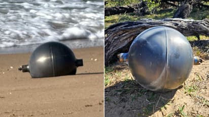 Mysterious metal spheres found on Australian beach , Rocket, Australia