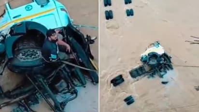 Truck Falls From Bridge, Driver Sits On Tyre